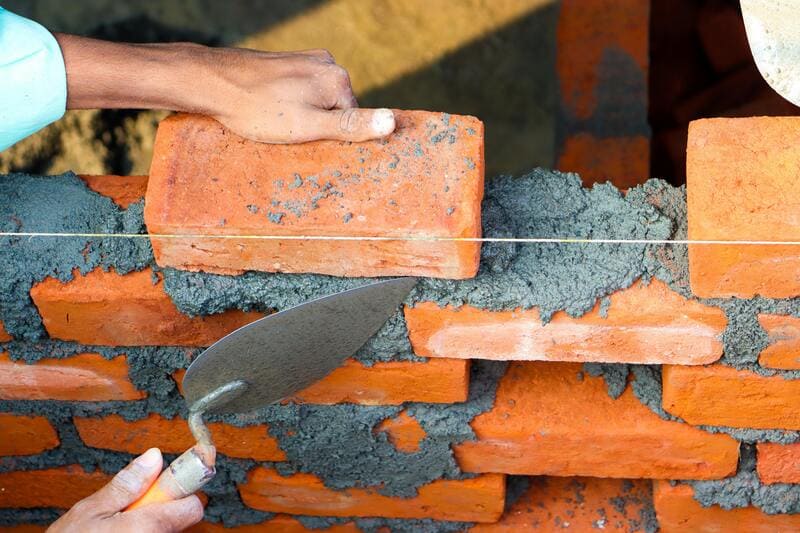 Masonry contractor at work